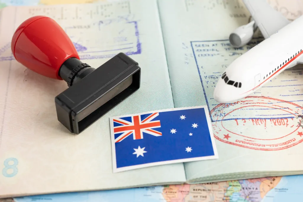 Pasaporte con sello, avión y bandera de Australia